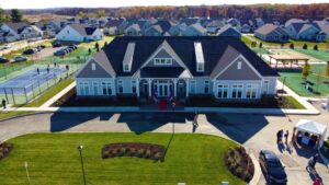 West Brandywine Community Clubhouse with sign in tent and tennis courts