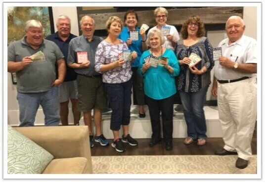 People standing around in the traditions of America clubhouse