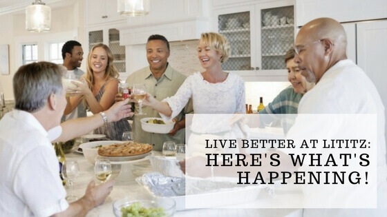 People enjoying a dinner in the kitchen of a traditions of america home