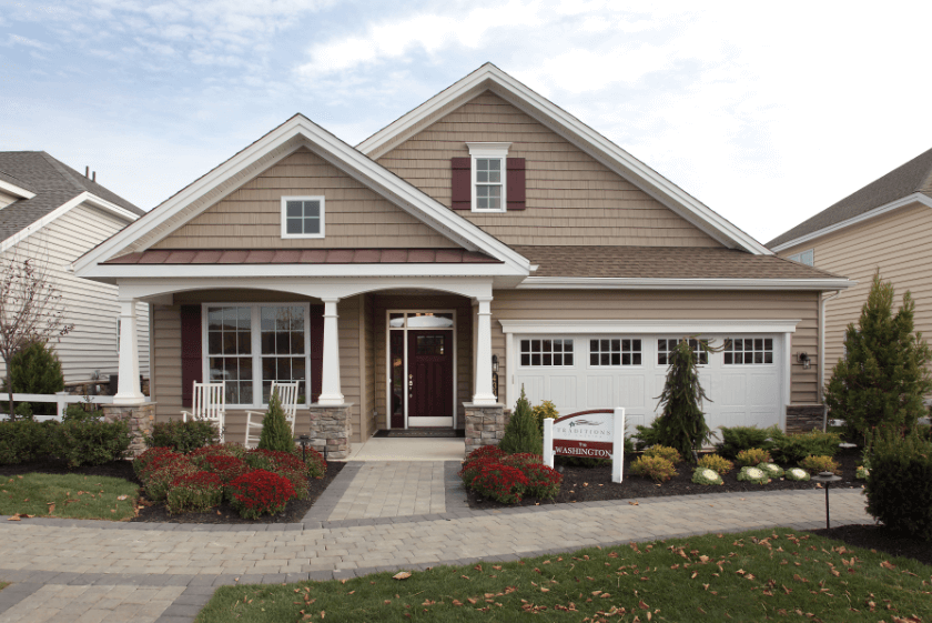 Front elevation of a tan home from Traditions of America