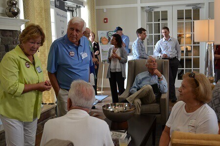 People speaking to each other after a Traditions of America event