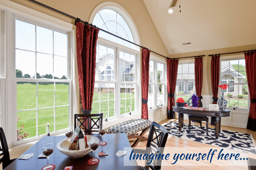 Living room with dining room next to it