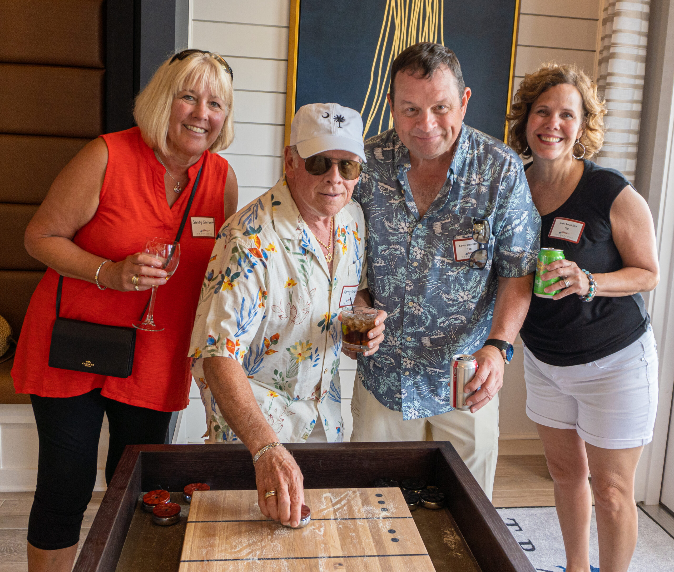 People playing shuffleboard in the Traditions of America clubhouse