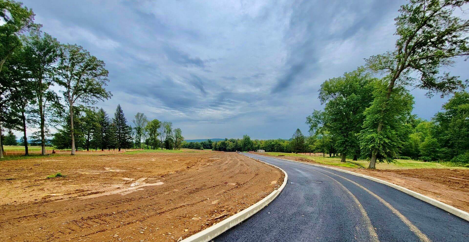 Road with construction happening on either side