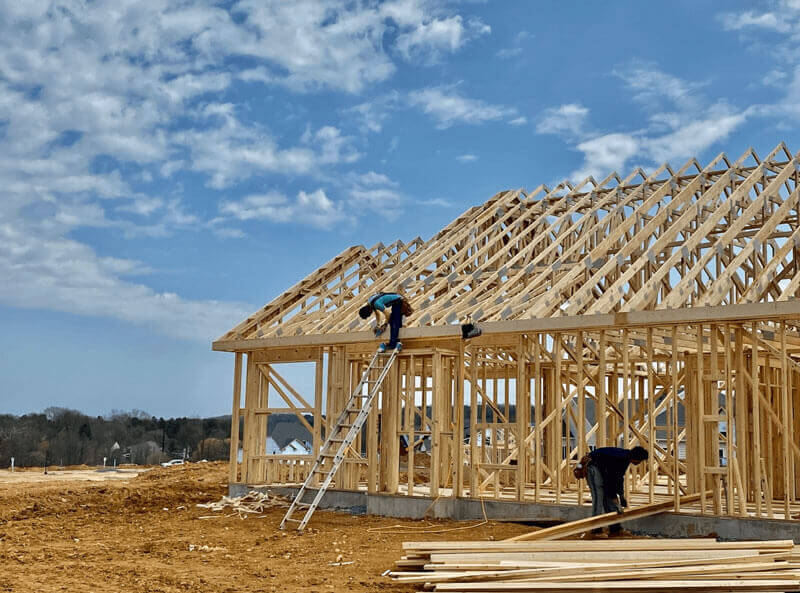 Exterior of an under-construction home from Traditions of America 