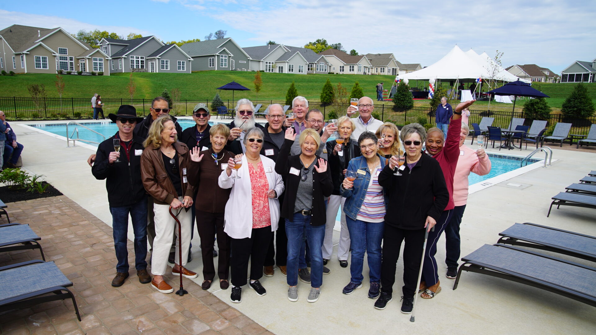 people by the clubhouse pool in east petersburg from traditions of america