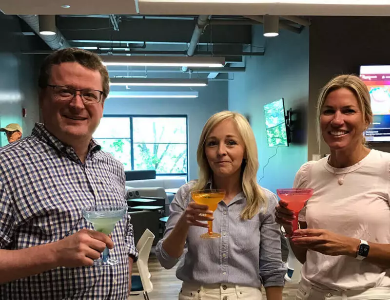 Three Traditions of americas employees enjoying margaritas